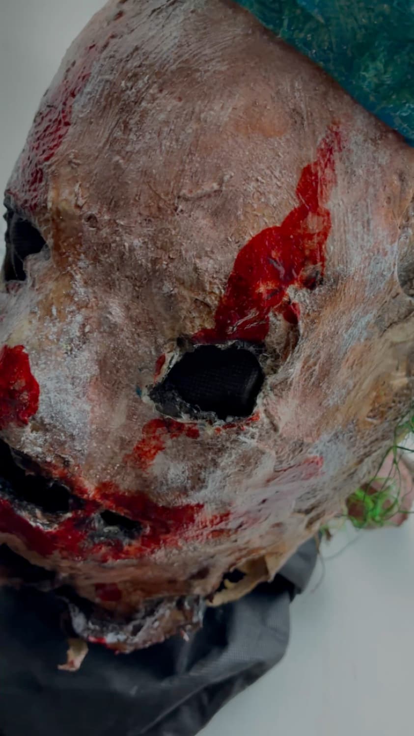 A mask and special effects piece made at Tomb Gallery