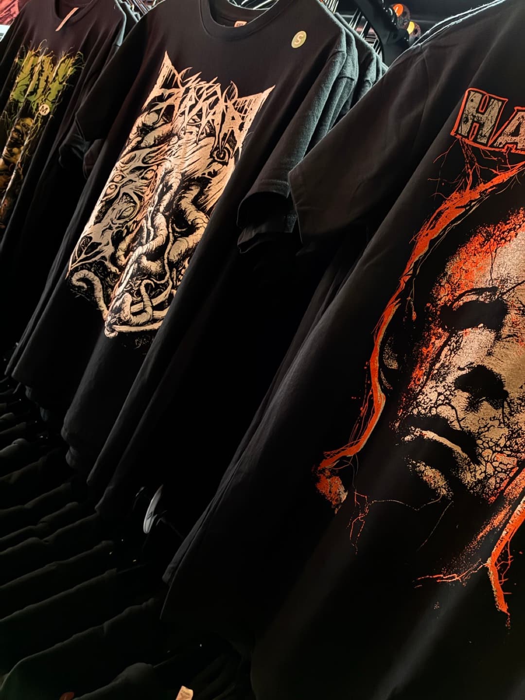Apparel and prints on the racks inside Tomb Gallery in Salem