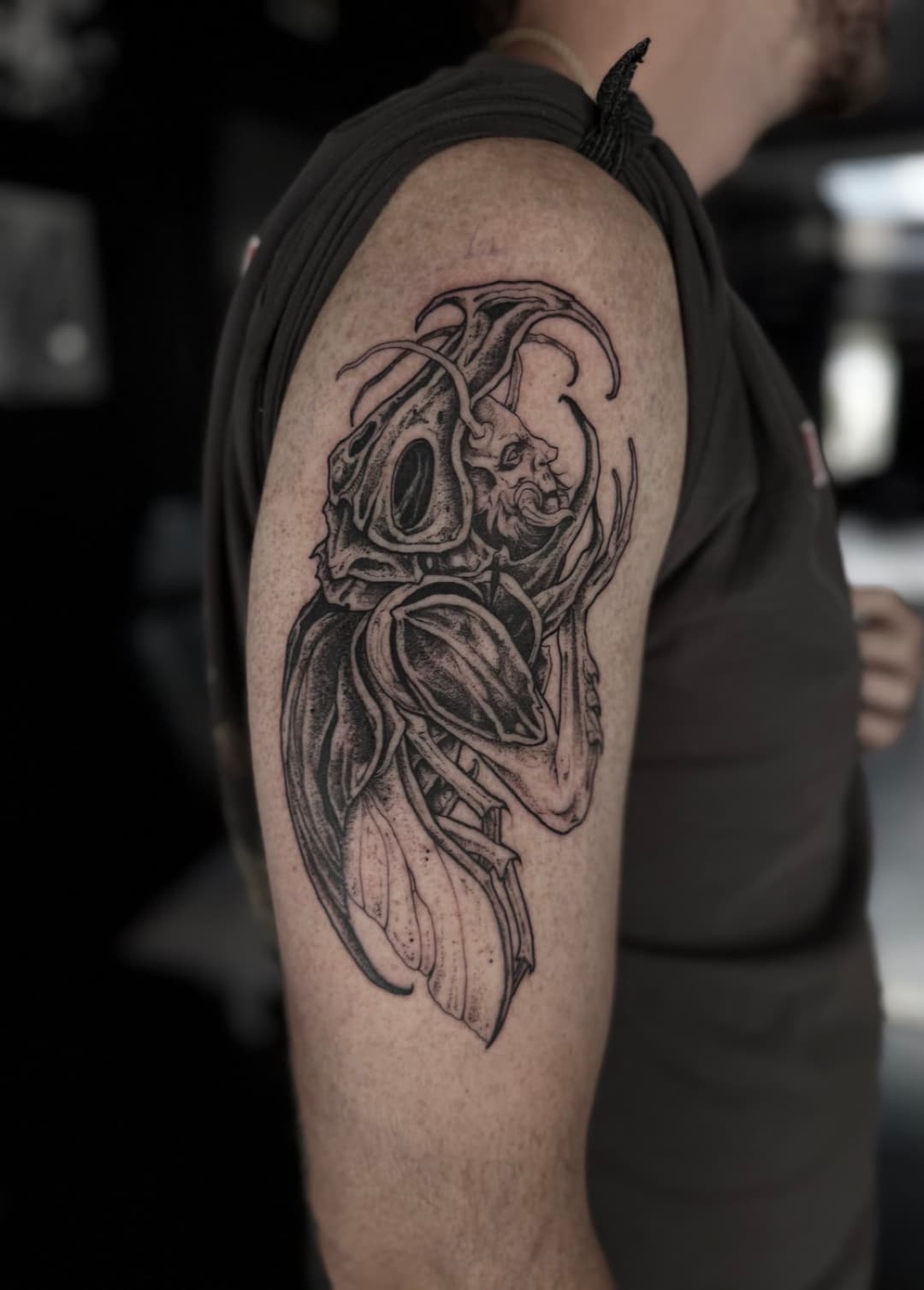 Dark illustrative tattoo by Miles at Tomb Gallery in Salem