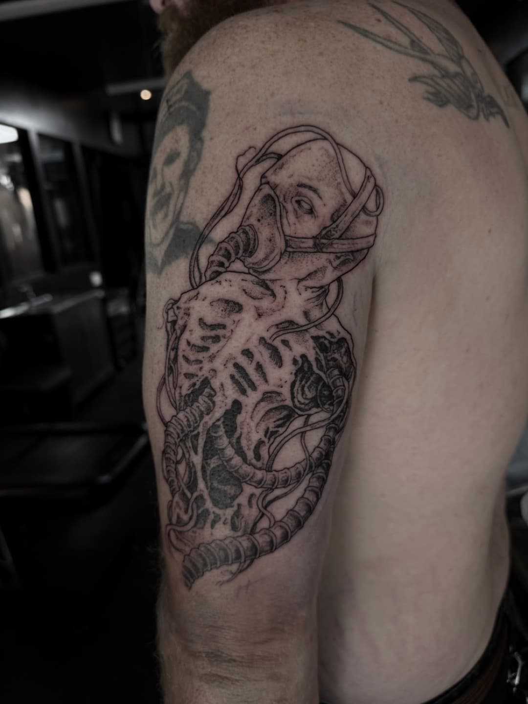 Dark illustrative tattoo by Miles at Tomb Gallery in Salem